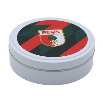 FCA Bonbons in weißer Box mit grünem FCA Pattern und farbigem FCA Wappen darauf 